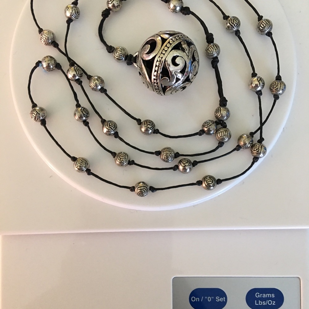 Silver pendant station necklace